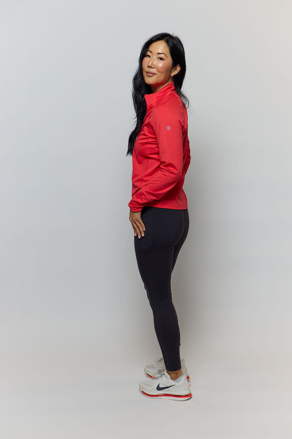 Go Again Full Length Legging shown in a deep squat to demonstrate squat-proof coverage