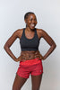 Woman wearing the 99'er Padded Sports Bra by Goal Five