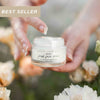 Anti-aging facial moisturizer cream in glass jar